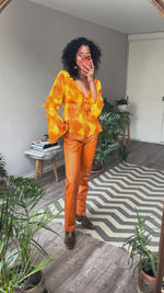 Abrir y reproducir video en la galería Pantalón Piel Naranja HUGO BUSCATI
