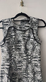 Abrir y reproducir video en la galería Vestido poliester y poliamida. B/N DIANE von FURSTENBERG (retail: 10,500 pesos)
